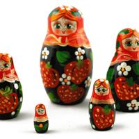 Nesting dolls with strawberries