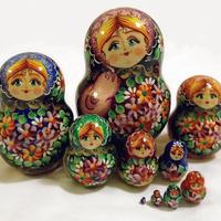 Wooden dolls with flowers