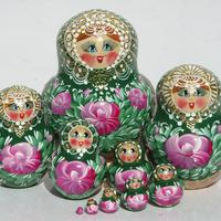 Green stacking dolls