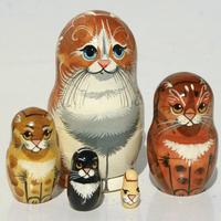Red-headed cat nesting dolls