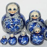 Blauwe houten poppen